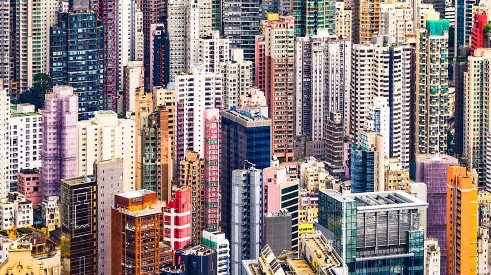 an image of a cityscape with coloring added to the buildings