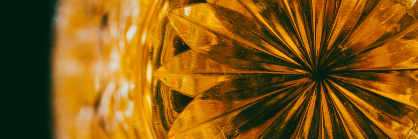 Close-up view of whisky in a crystal glass tumbler