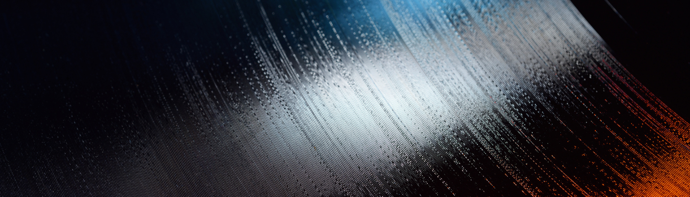 Close-up shot of 12-inch LP vinyl record groove